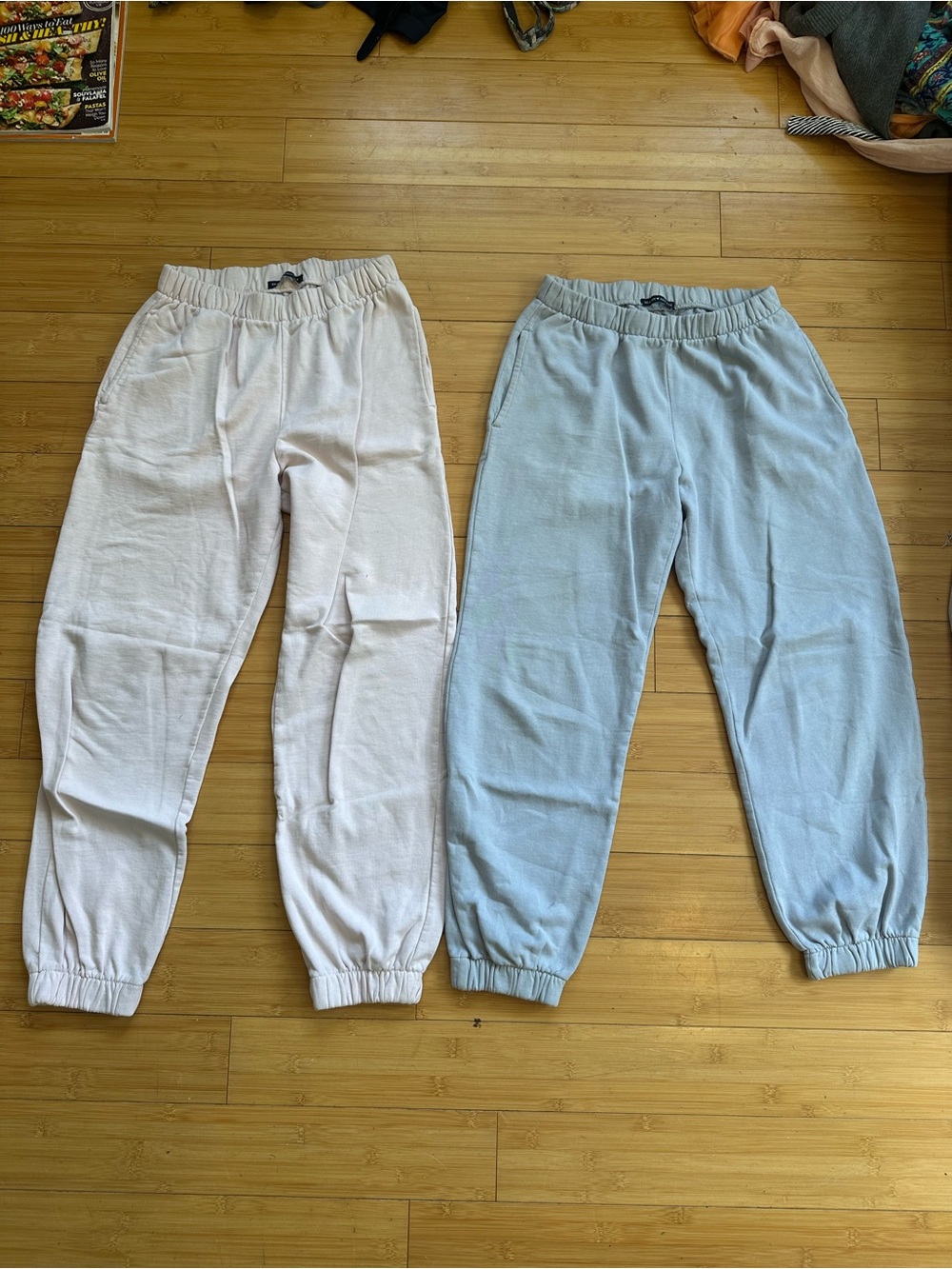 Brandy Melville sweats in light pink and Light Blue